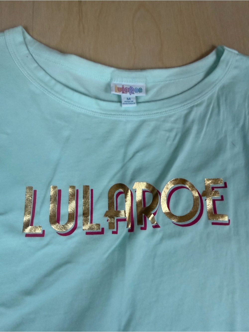 LuLaRoe Mint Green Tee with Gold and Pink Logo